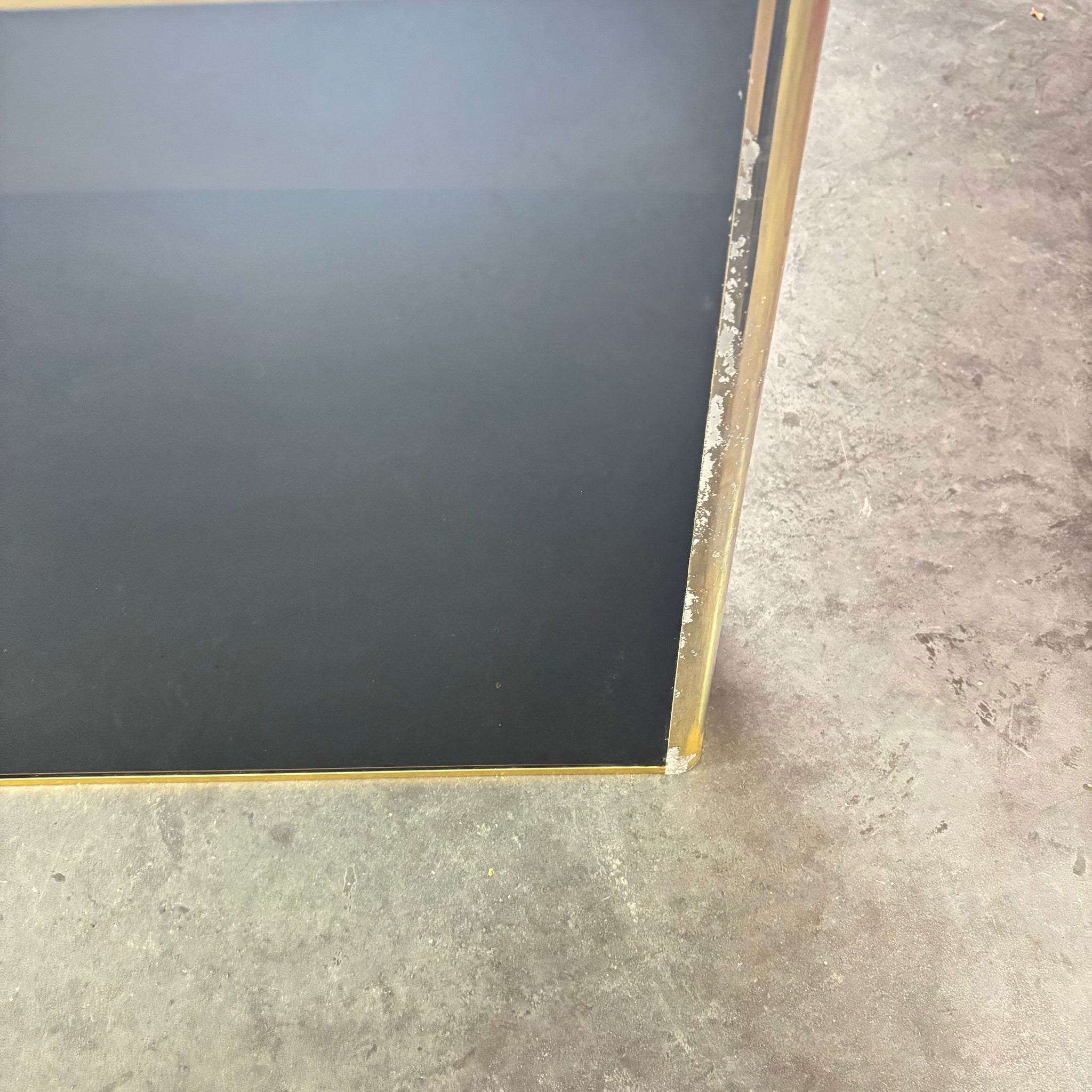 Console en laiton et miroir noir